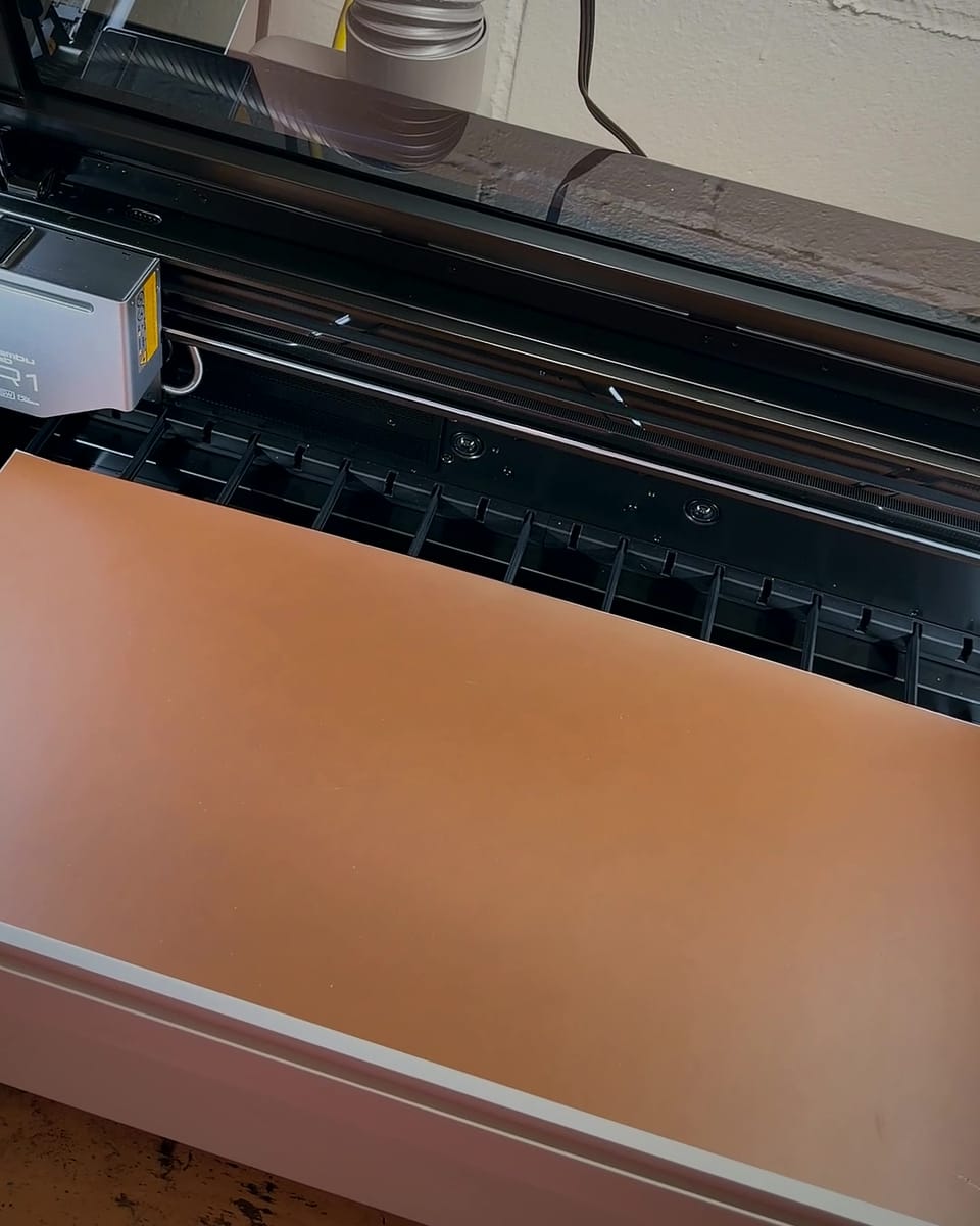 A sheet of Rawhide leatherette inside the R1 laser